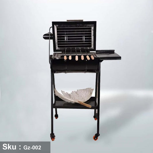 Charcoal grill with side rack - perfect for outdoor family gatherings